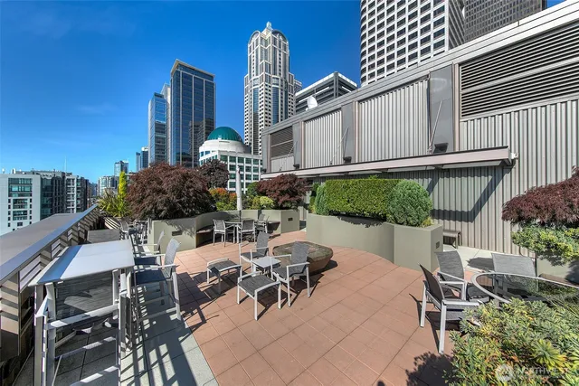 a view of city with tall buildings