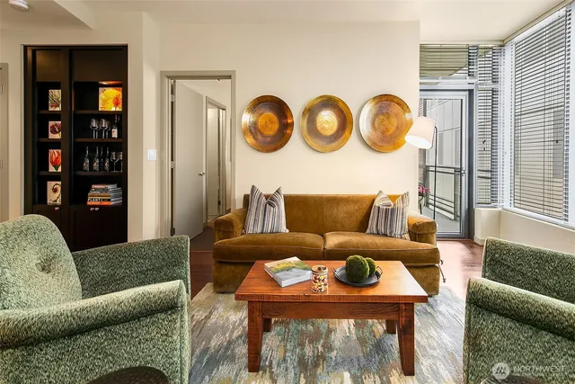 a living room with furniture and a table