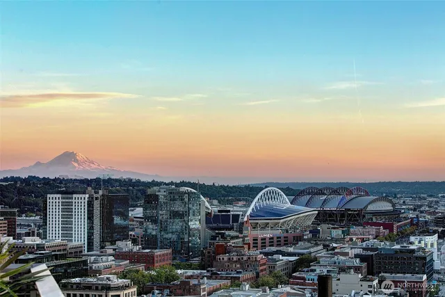 a view of a patio with a table and chairs