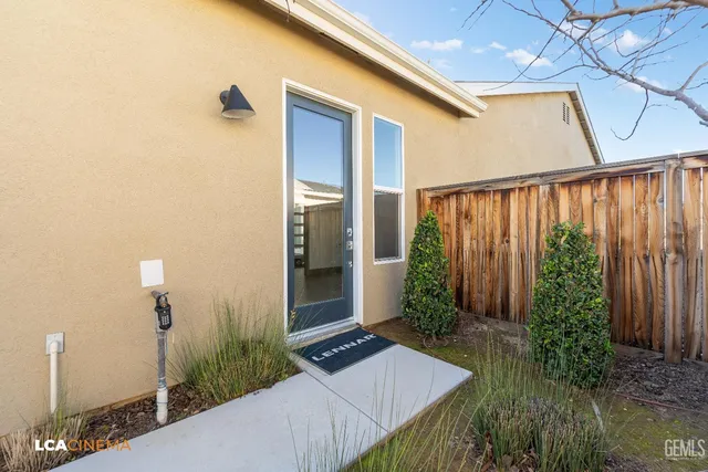 a balcony view with a backyard space