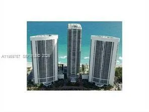 a view of balcony with floor to ceiling windows