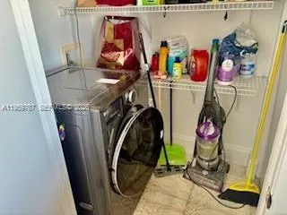 a view of storage and utility room