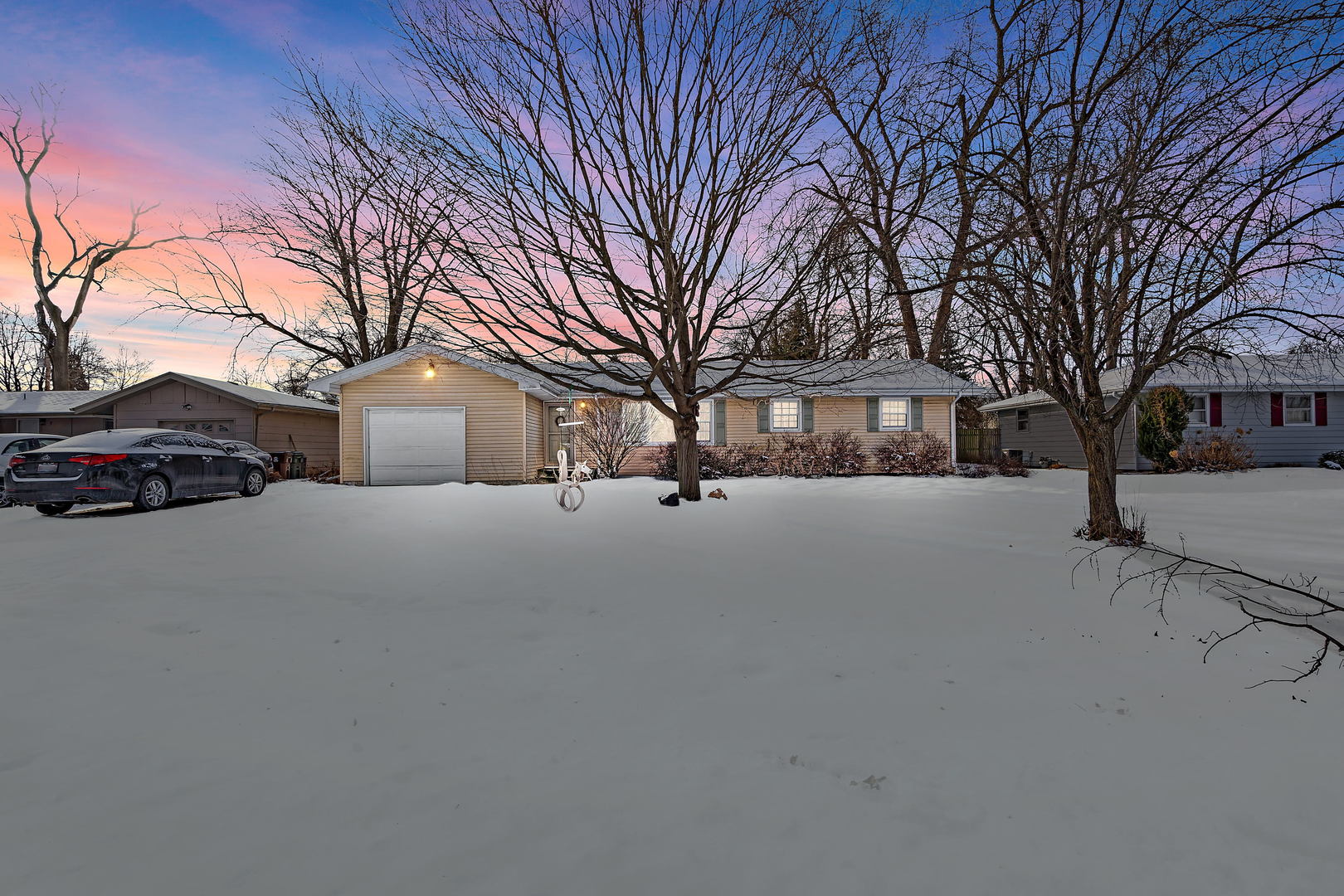 9 Strasma S Drive Kankakee, IL 60901 - Photo 1 of 16 a view of snow on the side of road