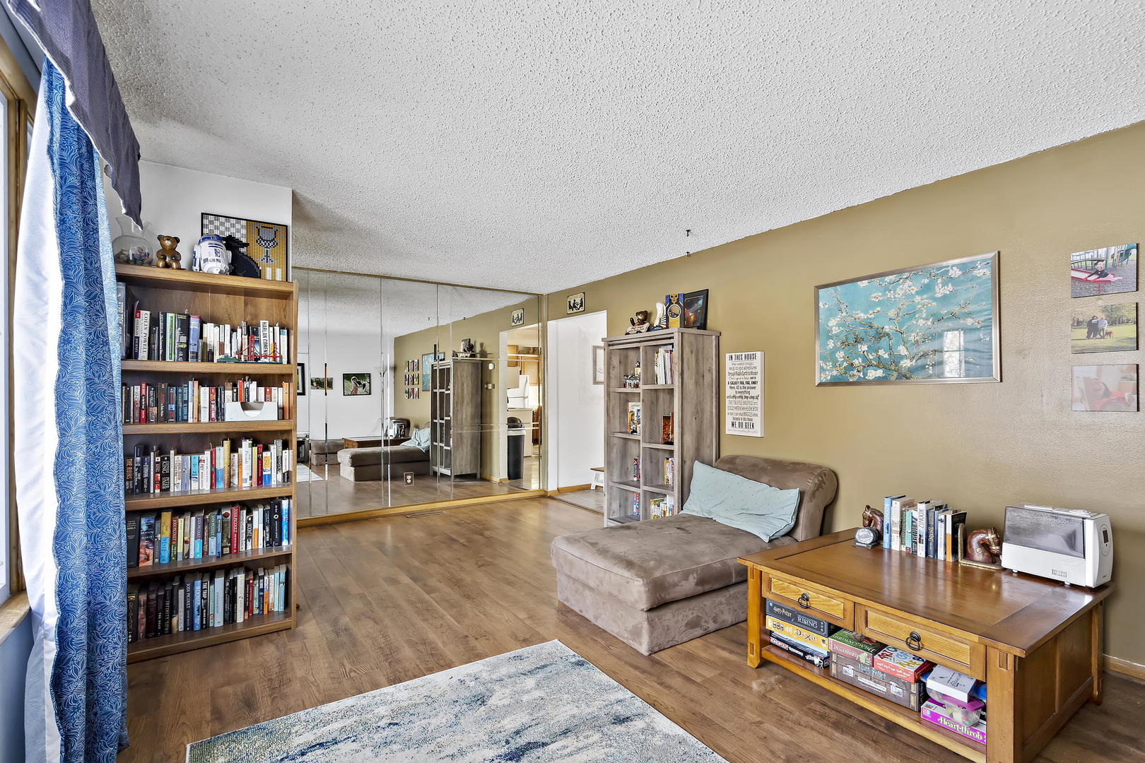 9 Strasma S Drive Kankakee, IL 60901 - Photo 4 of 16 a living room with furniture and a book shelf