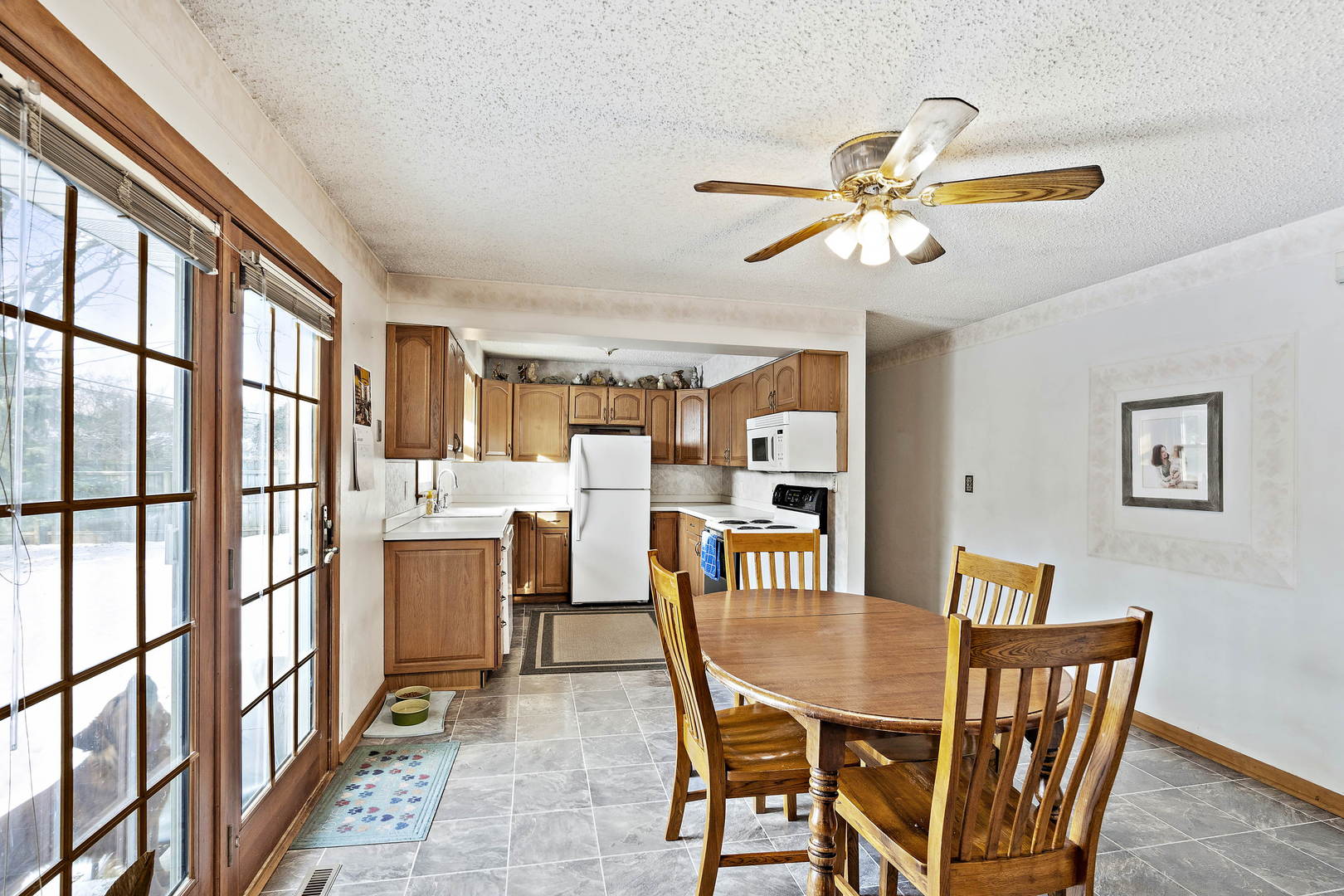 9 Strasma S Drive Kankakee, IL 60901 - Photo 8 of 16 a dining room with furniture and window