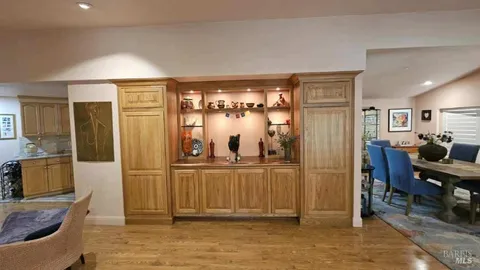 a view of a living room and dining room