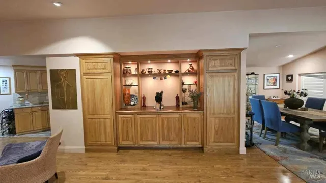 a view of a living room and dining room