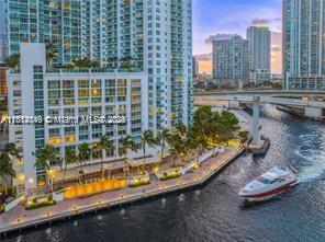 31 Southeast 5th Street, Unit 1908 Miami, FL 33131 - Photo 31 of 43 a view of swimming pool with outdoor seating