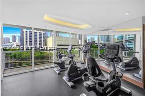 31 Southeast 5th Street, Unit 1908 Miami, FL 33131 - Photo 34 of 43 a view of a room with gym equipment