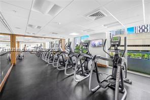 31 Southeast 5th Street, Unit 1908 Miami, FL 33131 - Photo 35 of 43 a view of a room with gym equipment