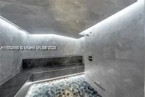 a view of a room with windows