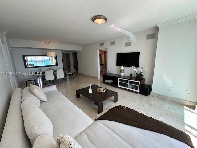 31 Southeast 5th Street, Unit 1908 Miami, FL 33131 - Photo 6 of 43 a living room with furniture and a flat screen tv