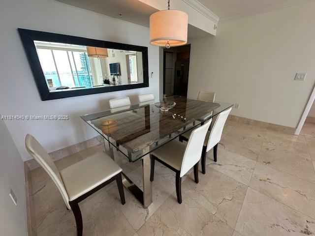 31 Southeast 5th Street, Unit 1908 Miami, FL 33131 - Photo 7 of 43 a dining room with furniture and window