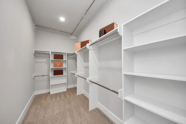 a view of a hallway with staircase