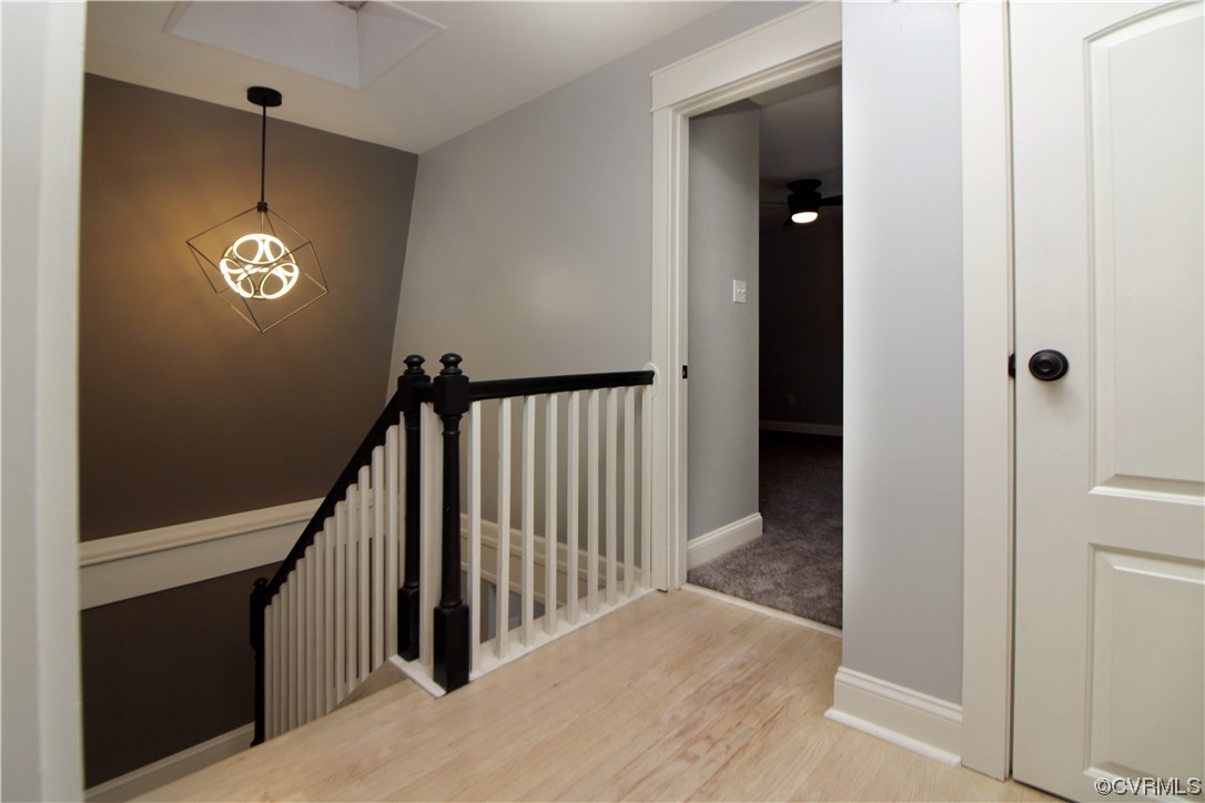 741 Waltons Store Road Louisa, VA 23093 - Photo 19 of 42 a view of a hallway with entryway and chandelier