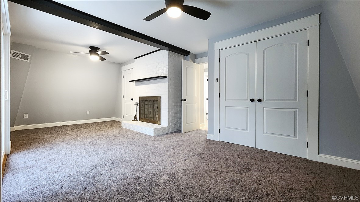 741 Waltons Store Road Louisa, VA 23093 - Photo 20 of 42 a view of empty room with ceiling fan