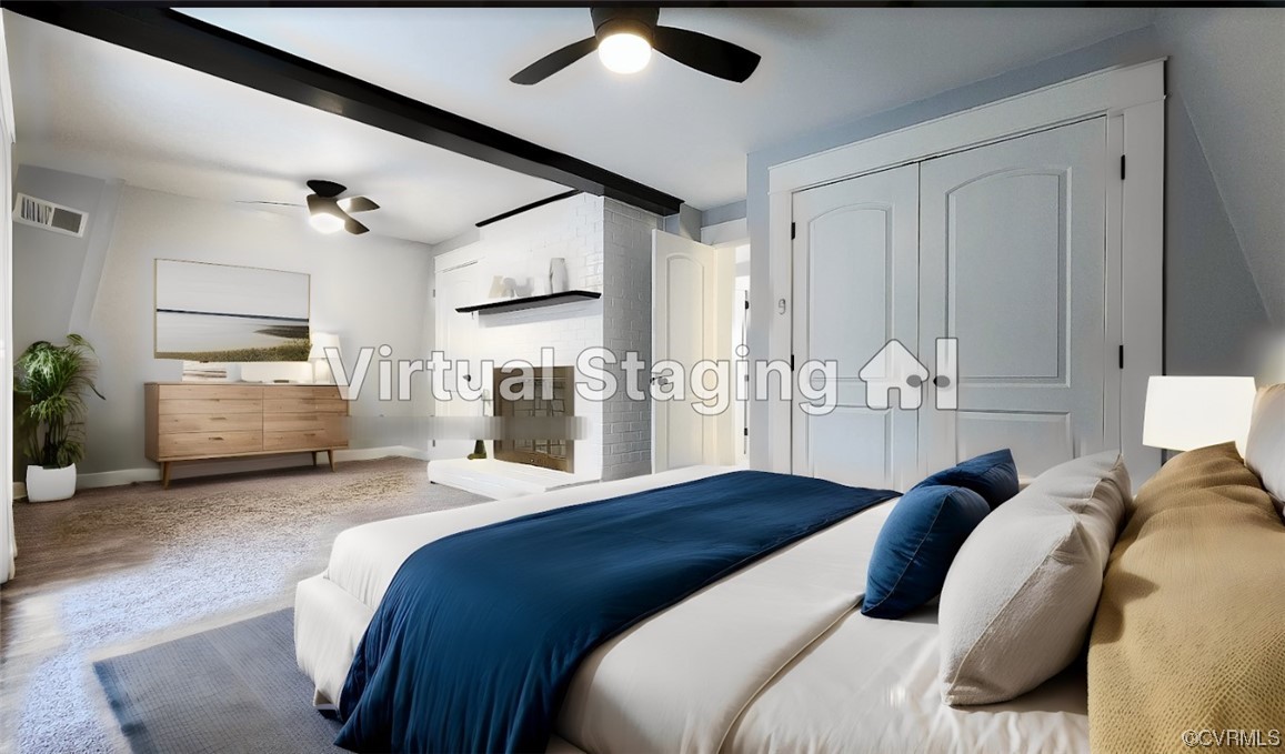 741 Waltons Store Road Louisa, VA 23093 - Photo 21 of 42 a bedroom with bed and a chandelier