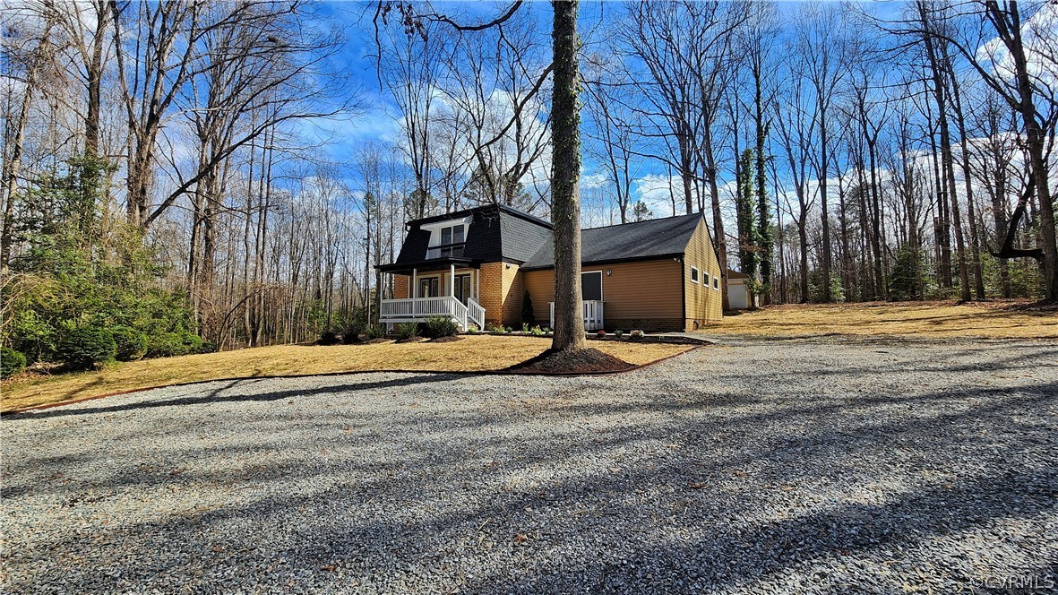 741 Waltons Store Road Louisa, VA 23093 - Photo 33 of 42 a view of a house with a yard and tree s