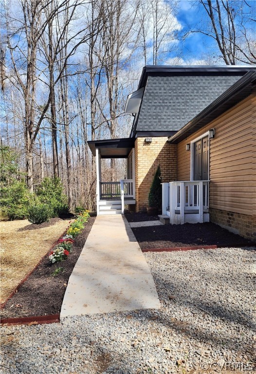 741 Waltons Store Road Louisa, VA 23093 - Photo 35 of 42 a view of a house with a yard and wooden fence