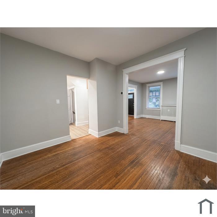 303 Webster Street Northwest Washington, DC 20011 - Photo 3 of 16 Spacious, light-filled living area.