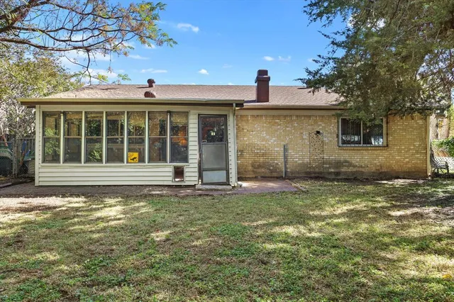 a backyard of a house with lots of green space