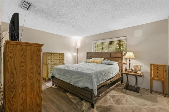 a bathroom with a tub and shower