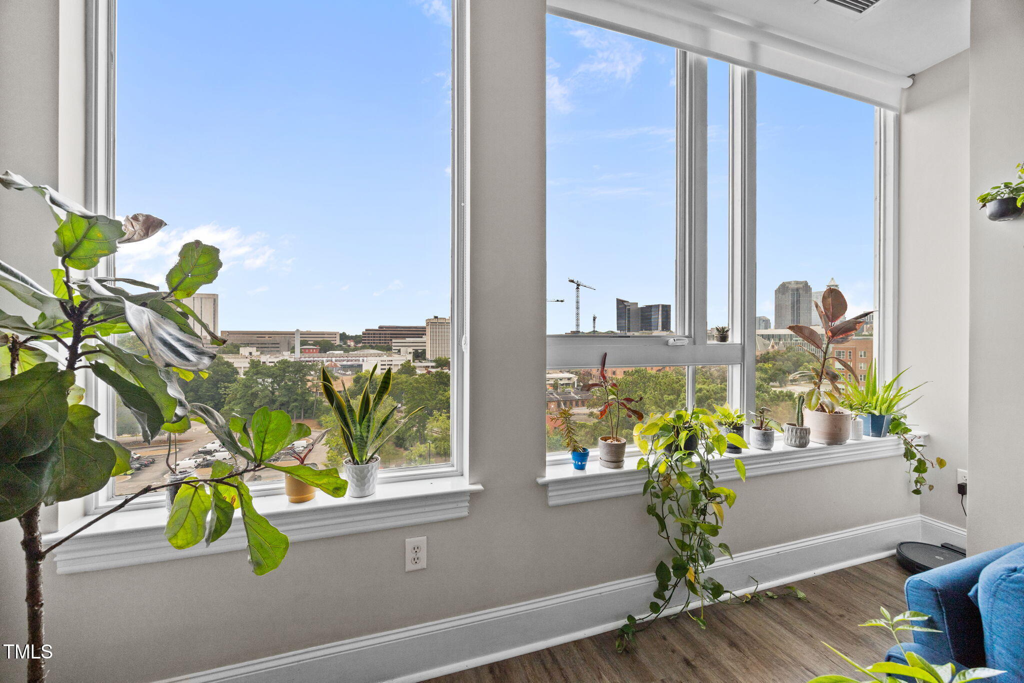 400 West North Street, Unit 1028 Raleigh, NC 27603 - Photo 4 of 30 a front view of a house with wooden floor