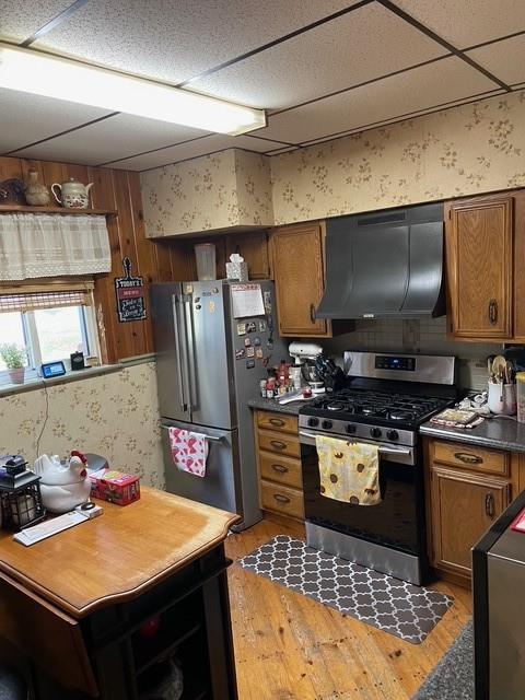 3401 Universal Road Pittsburgh, PA 15235 - Photo 11 of 35 a kitchen with stainless steel appliances granite countertop a sink stove and refrigerator
