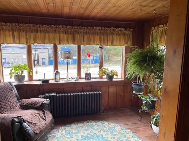 3401 Universal Road Pittsburgh, PA 15235 - Photo 20 of 35 a living room with a couch and a table