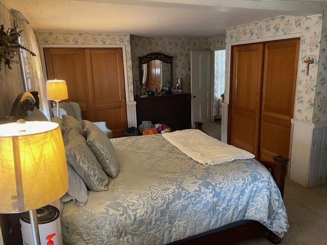 3401 Universal Road Pittsburgh, PA 15235 - Photo 23 of 35 a bedroom with a bed and wooden floor
