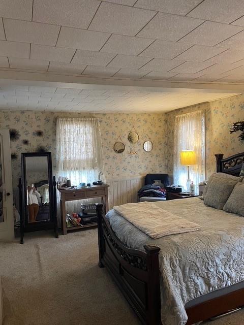 3401 Universal Road Pittsburgh, PA 15235 - Photo 24 of 35 a bedroom with a bed and a chandelier