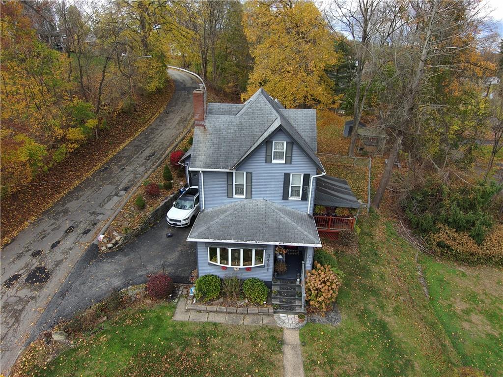 3401 Universal Road Pittsburgh, PA 15235 - Photo 33 of 35 a aerial view of a house next to a yard