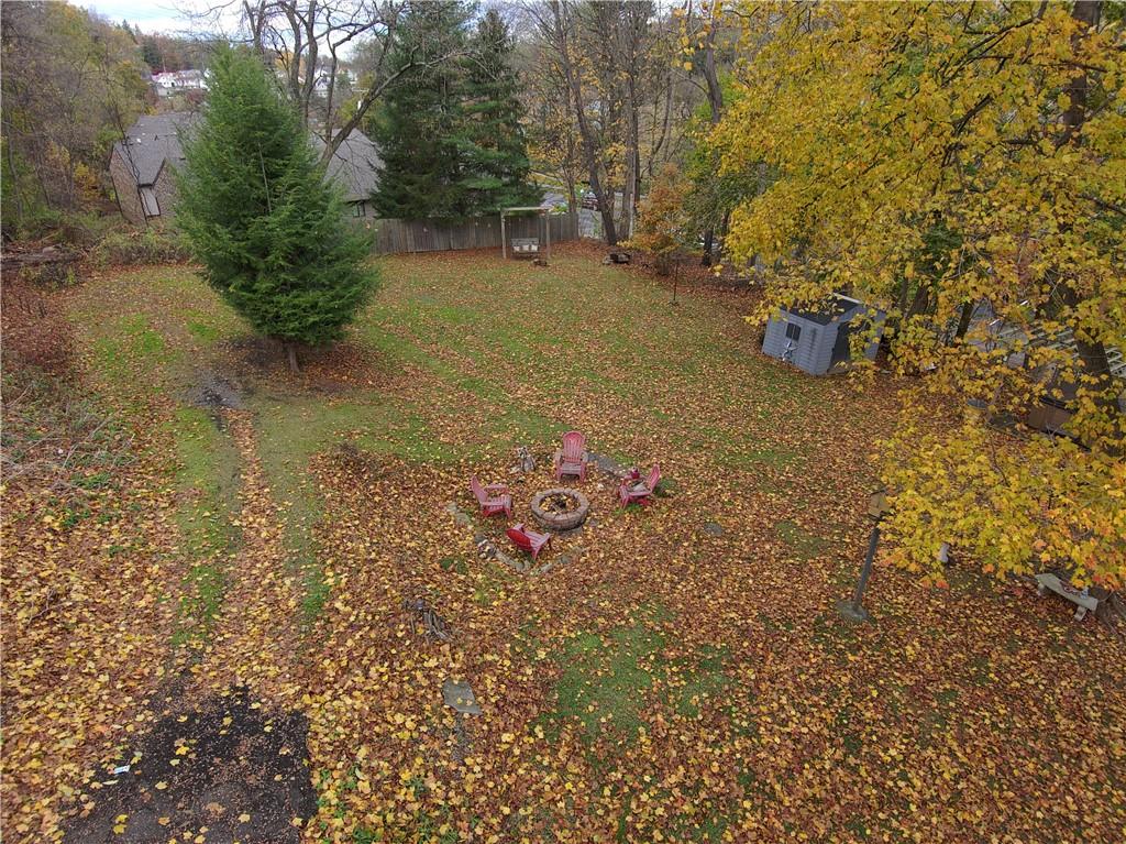 3401 Universal Road Pittsburgh, PA 15235 - Photo 34 of 35 a backyard of a house with lots of green space