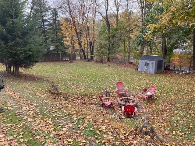 3401 Universal Road Pittsburgh, PA 15235 - Photo 7 of 35 a backyard of a house with table and chairs
