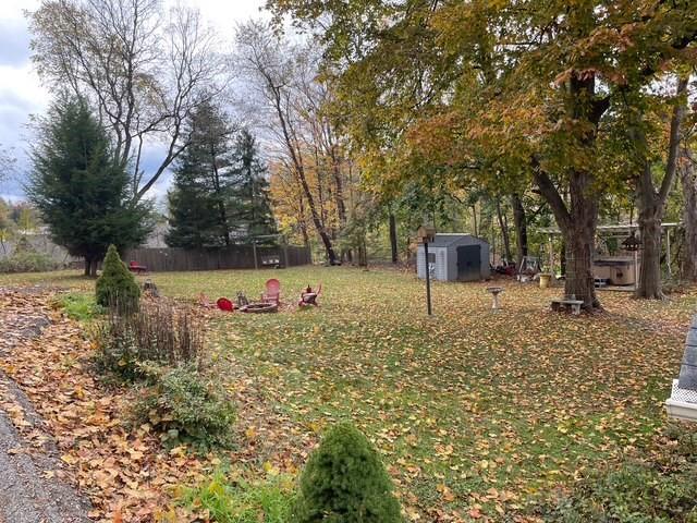 3401 Universal Road Pittsburgh, PA 15235 - Photo 8 of 35 a backyard of a house with lots of green space