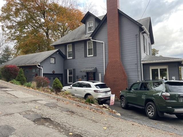 3401 Universal Road Pittsburgh, PA 15235 - Photo 9 of 35 a view of a car parked in front of a house