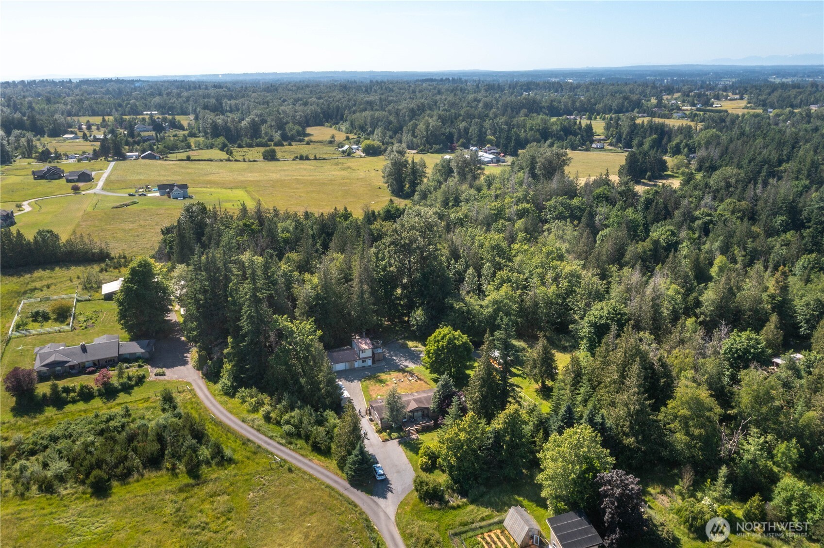 5459 Noon Road Bellingham, WA 98226 - Photo 38 of 40 an aerial view of residential houses with outdoor space and lake view