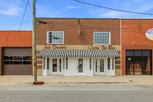 front view of a building with a street