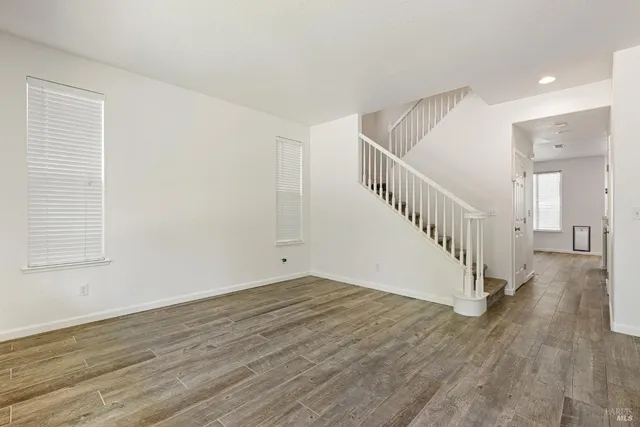 a view of a livingroom with wooden floor