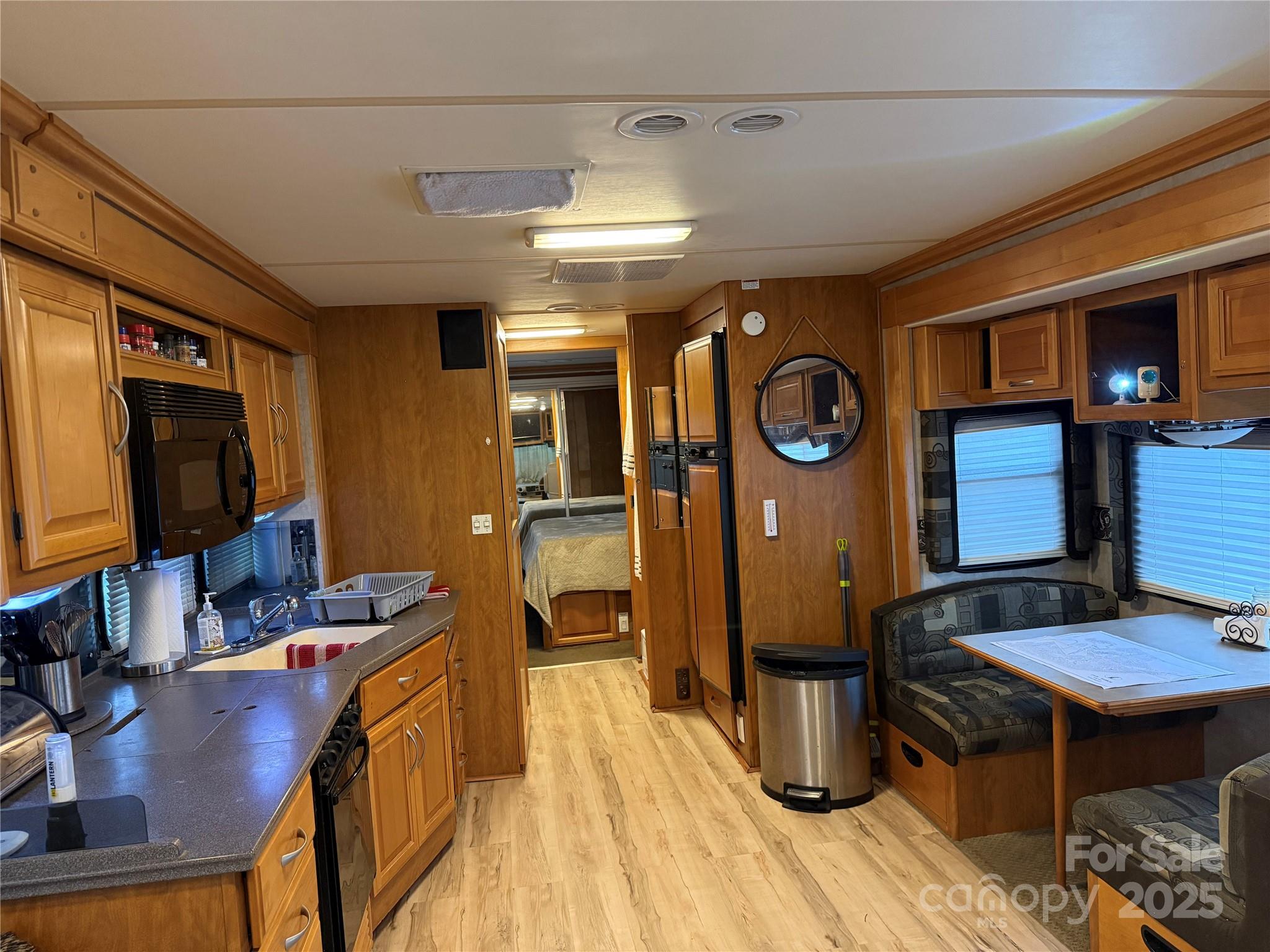 116 Muskhogean Way, Unit D74 Mount Gilead, NC 27306 - Photo 11 of 35 a very nice looking room with many windows