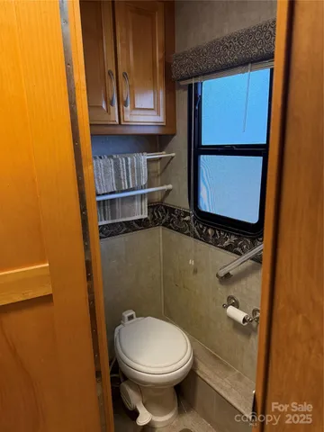 a view of outdoor space with wooden stairs