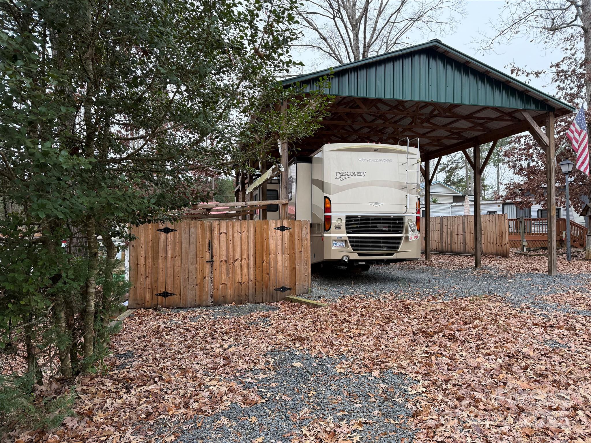 116 Muskhogean Way, Unit D74 Mount Gilead, NC 27306 - Photo 4 of 35 a car parked in front of a house