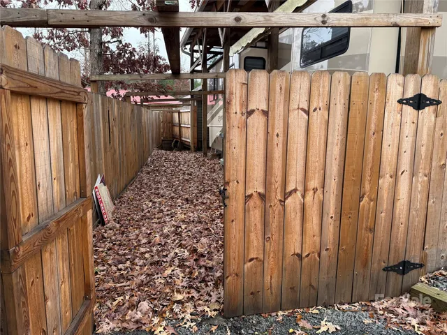 a view of a porch with a floor to ceiling window