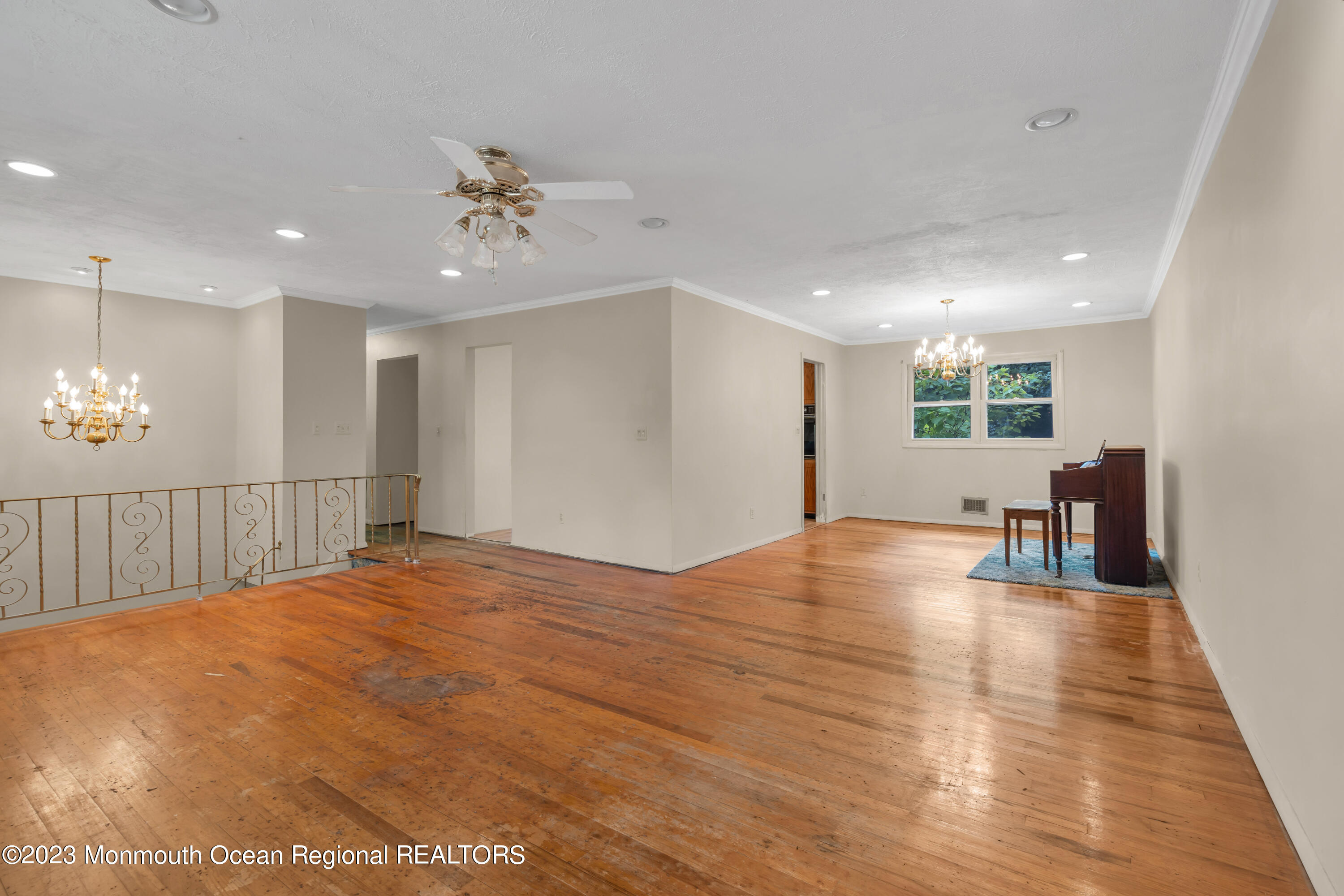 74 Willow Drive Jackson, NJ 08527 - Photo 5 of 20 a view of an empty room with wooden floor