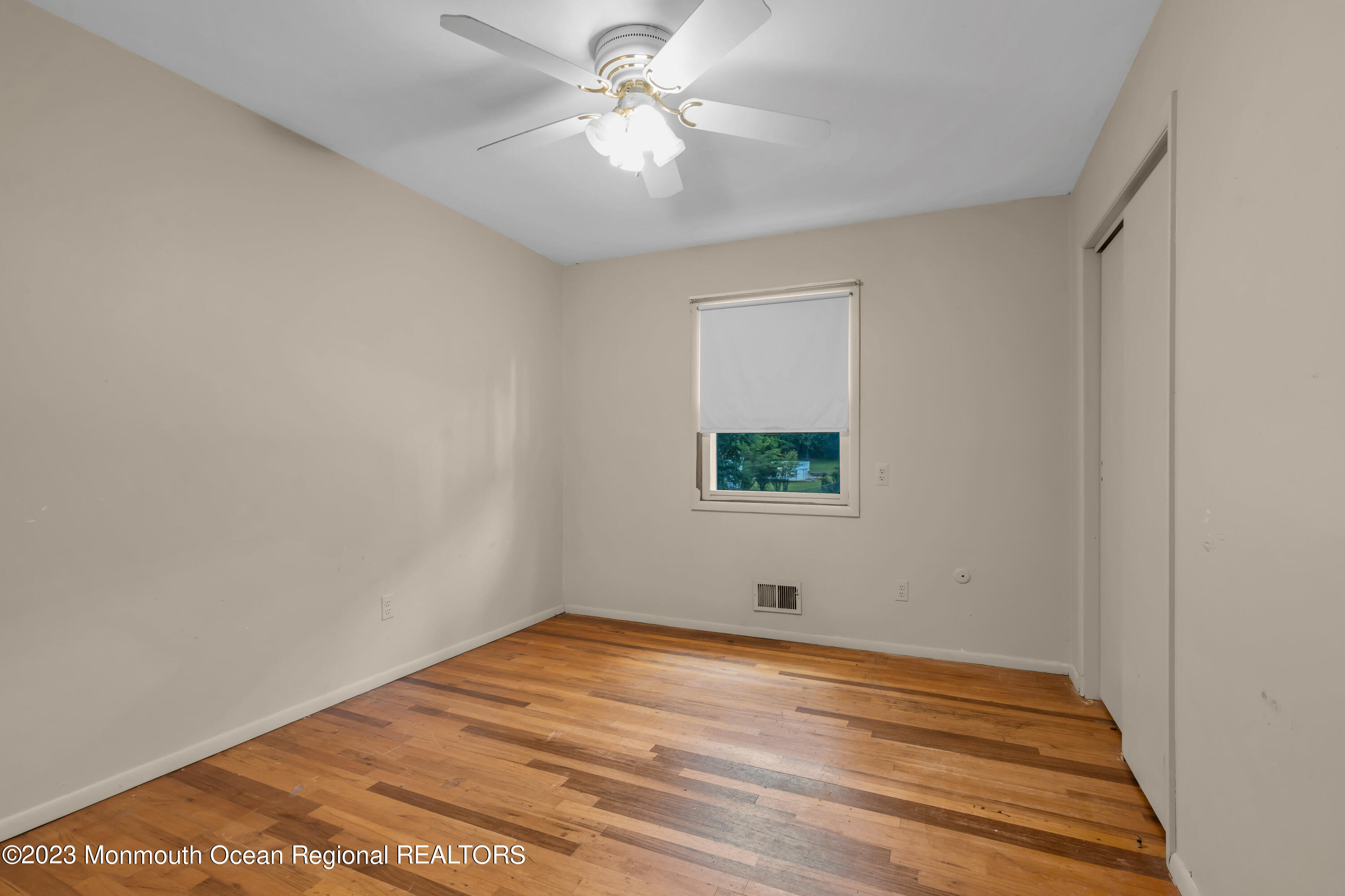 74 Willow Drive Jackson, NJ 08527 - Photo 10 of 20 a view of an empty room with a window