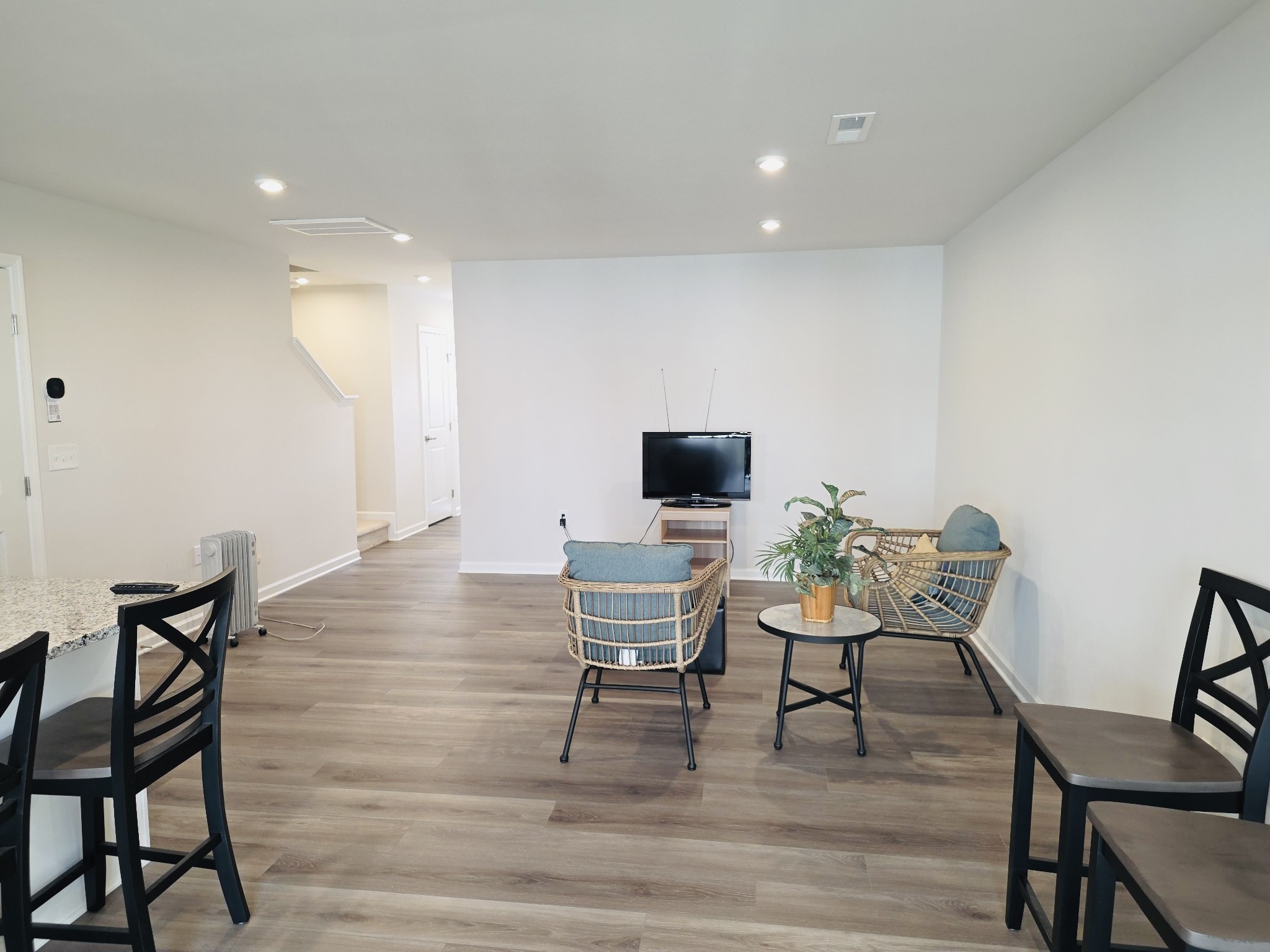 2112 Wisteria Loop Franklin, KY 42134 - Photo 3 of 14 a view of a dining room with furniture and wooden floor