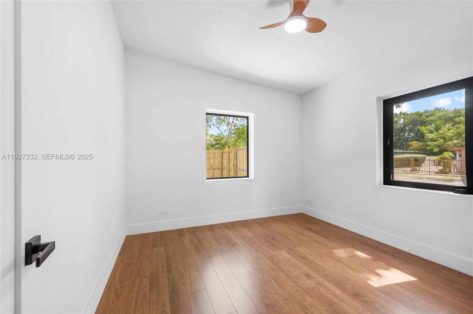 485 Northwest 132nd Street North Miami, FL 33168 - Photo 13 of 15 an empty room with a window
