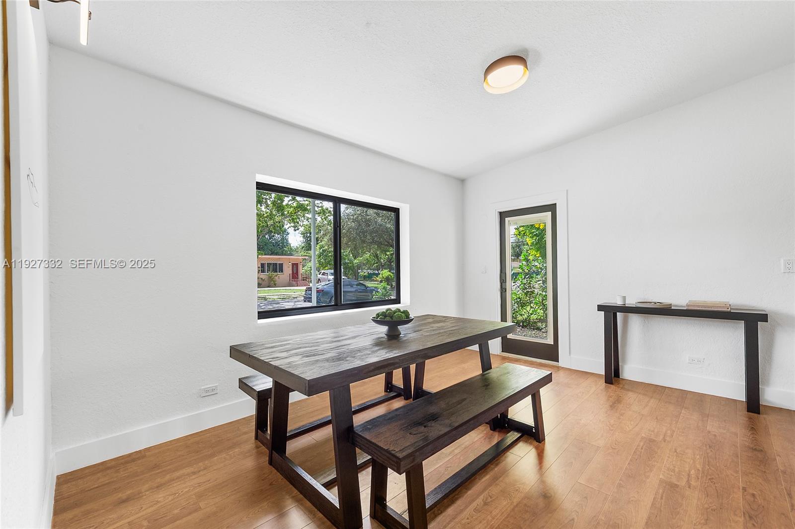 485 Northwest 132nd Street North Miami, FL 33168 - Photo 9 of 15 a living room with furniture and a window