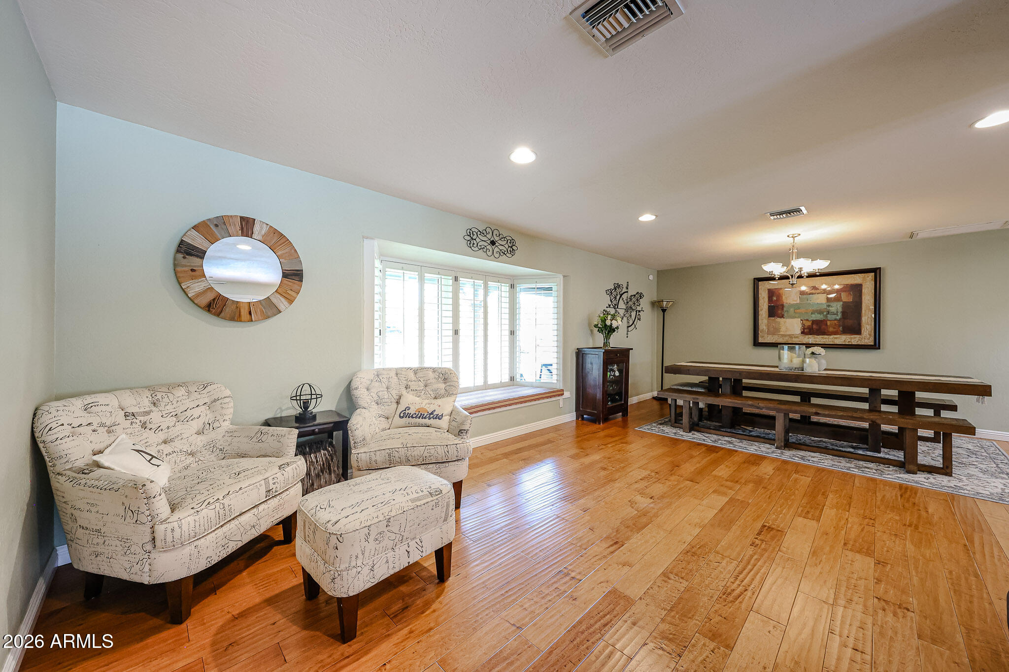 7113 North 8th Avenue Phoenix, AZ 85021 - Photo 13 of 57 a living room with furniture and a flat screen tv