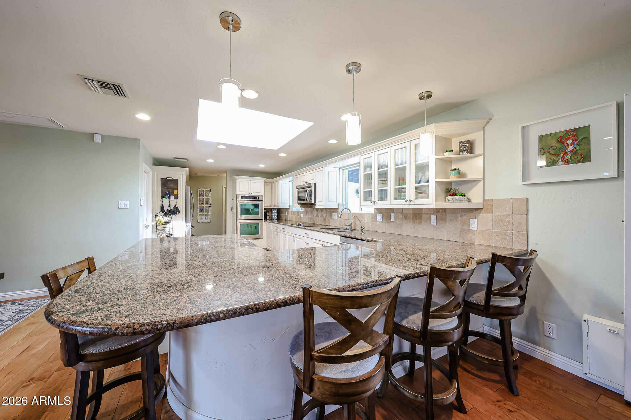 7113 North 8th Avenue Phoenix, AZ 85021 - Photo 19 of 57 a dining room with furniture and window